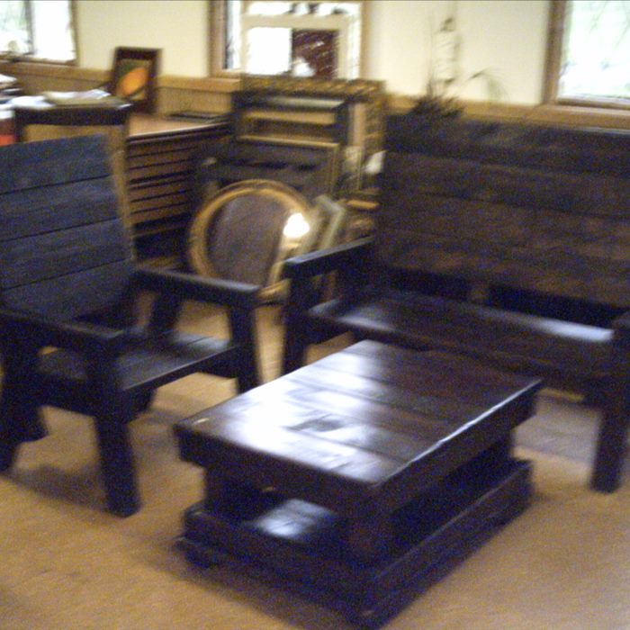 A lounge set: chairs, bench and coffee table