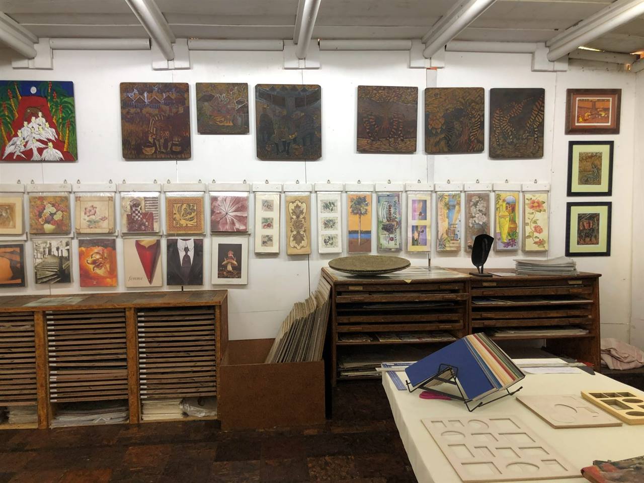 A wall of art prints and posters