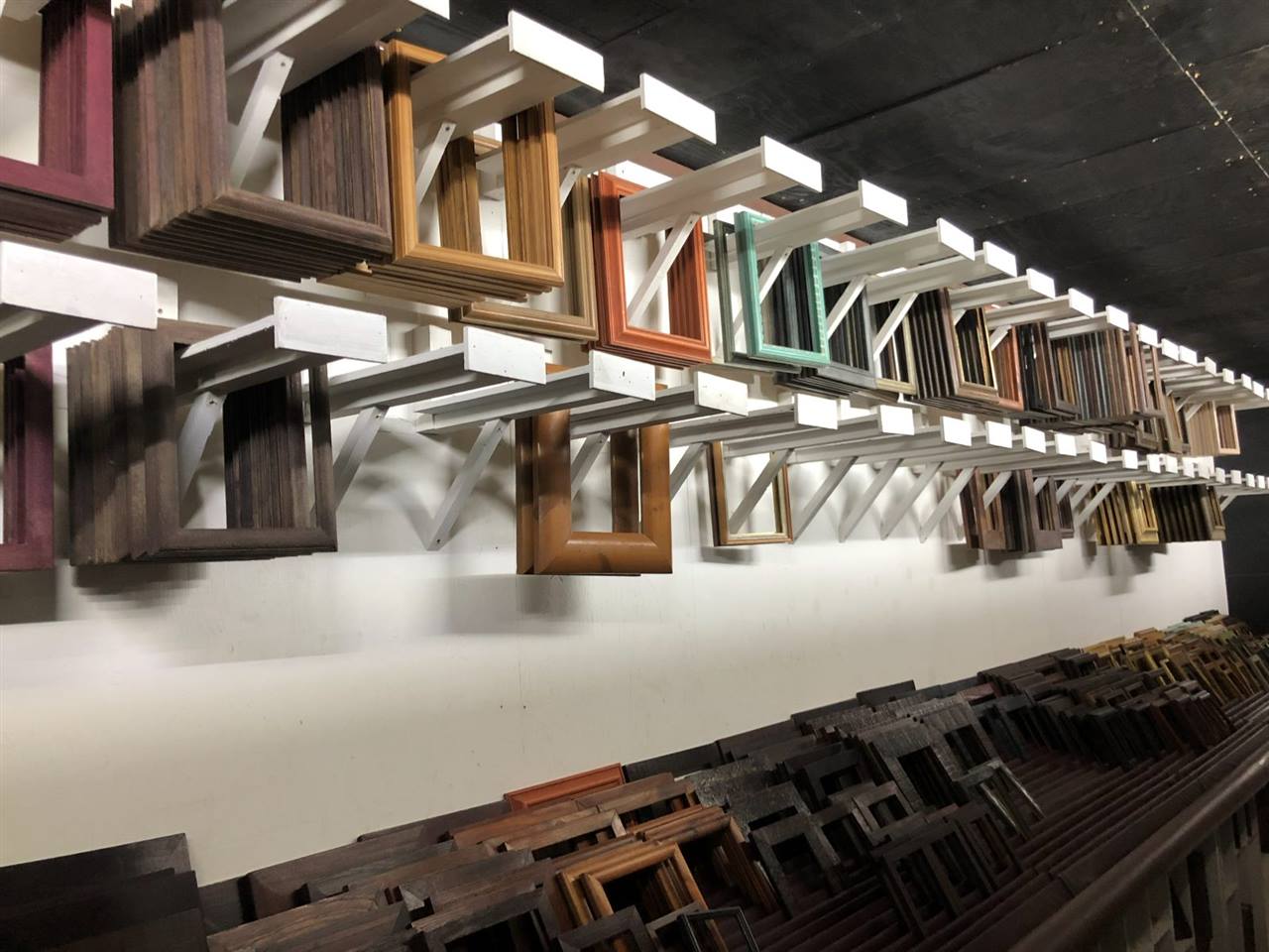 Ready-made frames hanging in rows